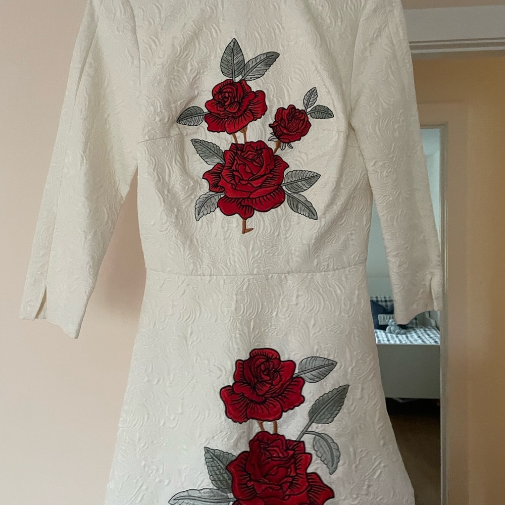 Elegant White Dress with Red Floral Embroidery